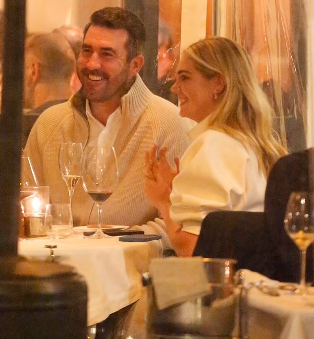Kate Upton looks incredible in white midi dress as she shares a kiss with husband Justin Verlander during romantic dinner in Rome