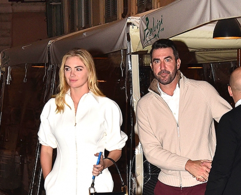 Kate Upton looks incredible in white midi dress as she shares a kiss with husband Justin Verlander during romantic dinner in Rome